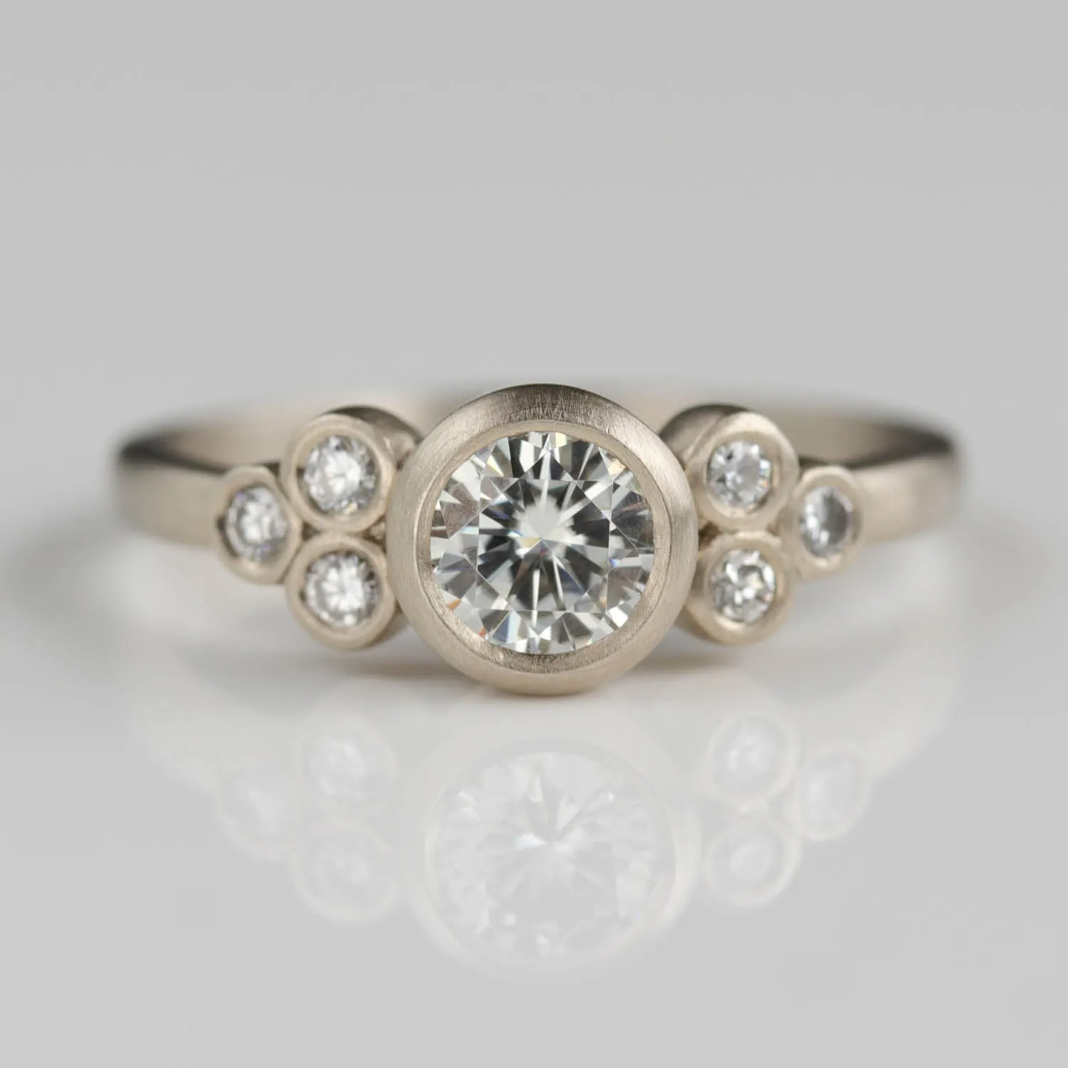 Bezel-set Seven Stone Cluster Ring •