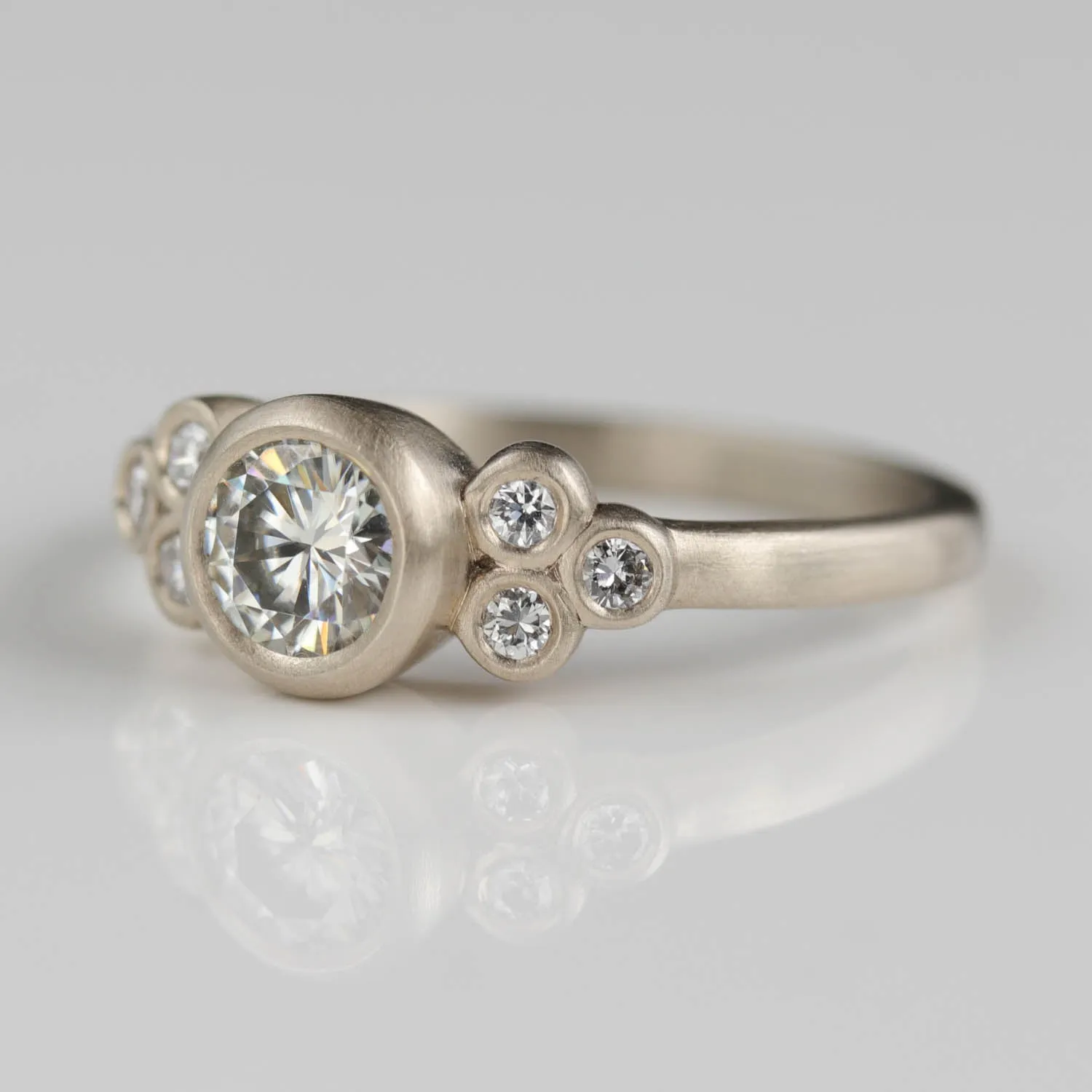 Bezel-set Seven Stone Cluster Ring •