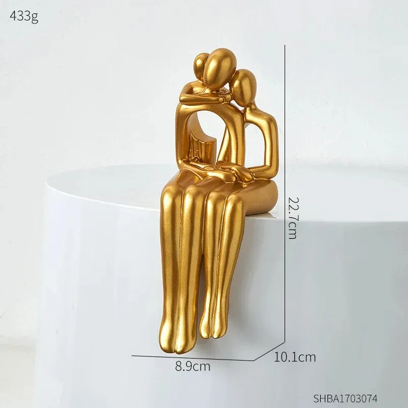 Golden Abstract Family Sculpture: Modern Resin Statue for Stylish Home Décor