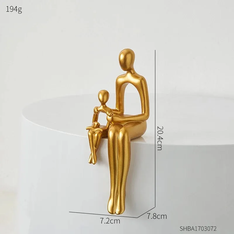 Golden Abstract Family Sculpture: Modern Resin Statue for Stylish Home Décor