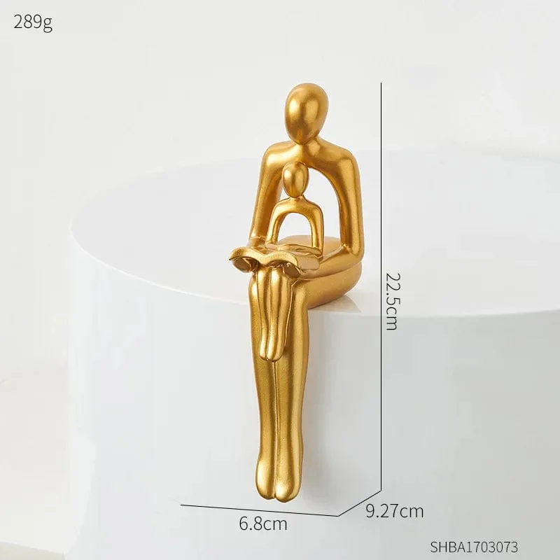 Golden Abstract Family Sculpture: Modern Resin Statue for Stylish Home Décor