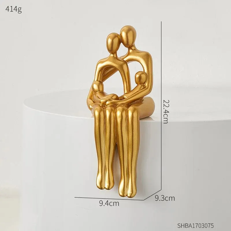 Golden Abstract Family Sculpture: Modern Resin Statue for Stylish Home Décor